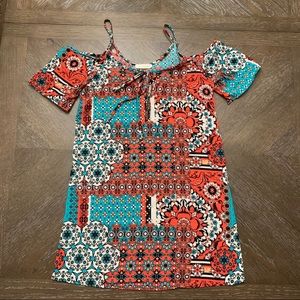 Orange and turquoise patterned girls dress